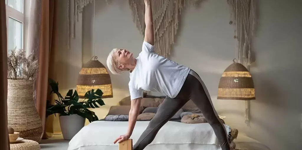 senior-woman-practicing-yoga-Techniques of Hatha Yoga-mytourguider-luxury-living